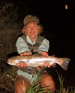Sue Melus with a 19" rainbow trout